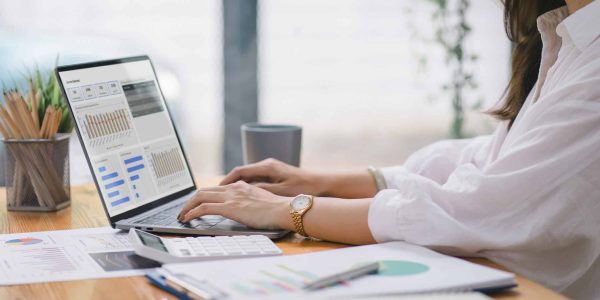 Female analysis researching SEO Trends.